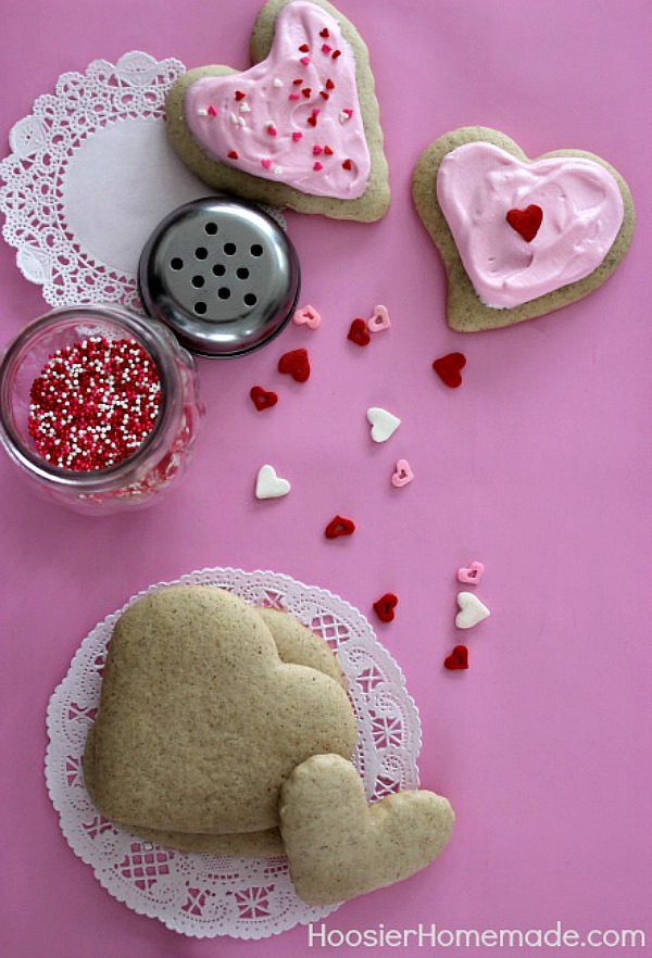 Whip up a batch of these Valentine Sugar Cookies! Once you try this Sugar Cookie Recipe, you will NEVER use another one! It's soft, full of flavor and delicious! 