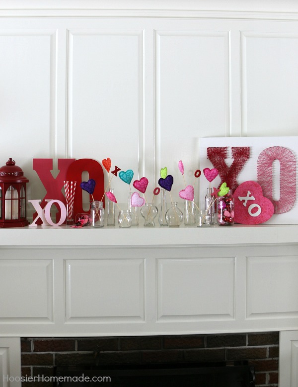 Valentine Decorating - Hugs and Kisses Mantel! Decorate your home with these easy ideas that had a little romance! Pin to your Valentine's Day Board!